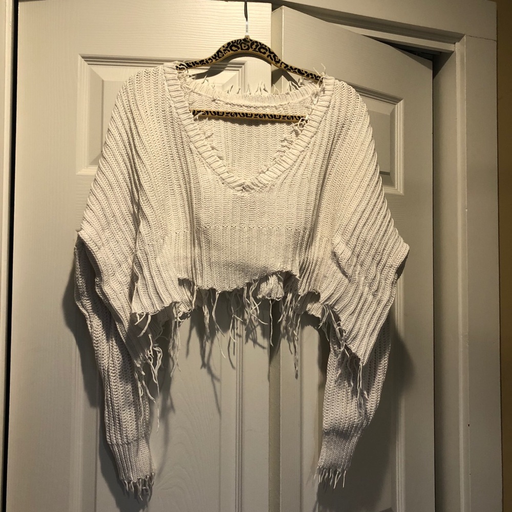 Distressed cropped sweater